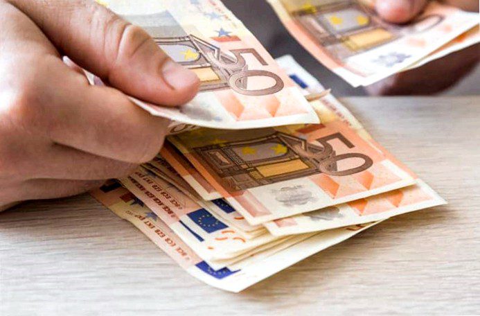 A person counts banknotes, he wants to renovate his house